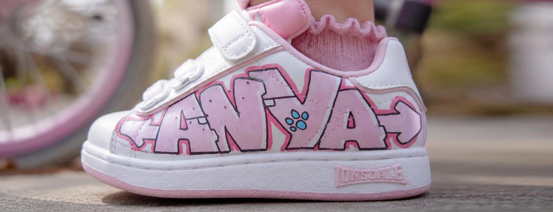 Hand-painted custom kids' trainers by BUBBLEHOPS